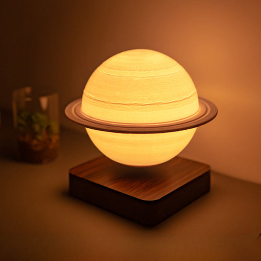 Black technology creative magnetic suspension Saturn lamp 18cm bedroom atmosphere three-color lamp desktop decoration gift for women