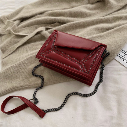 Cross-body rivet bag for lady