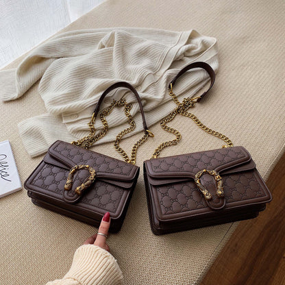 Inclined shoulder bag