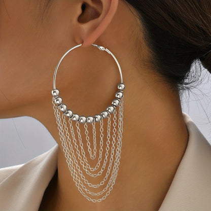 A Pair of Golden Circular Tassel Hoop Earrings
