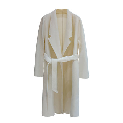 A minimalist mid-length woolen coat