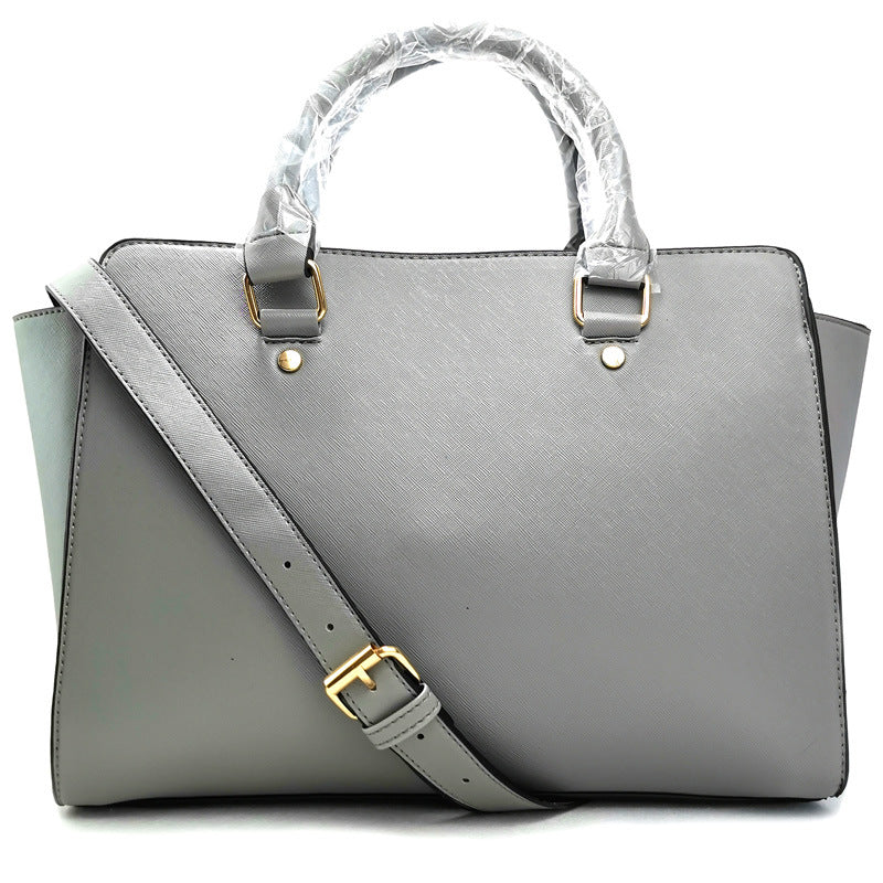 Smiley cross pattern shoulder bag