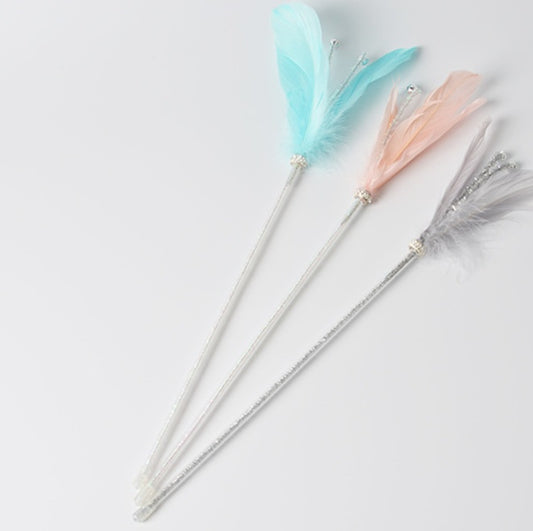 Long feather with bell