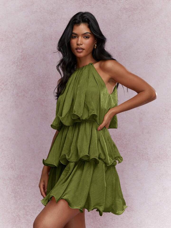 Strapless Sleeveless Sheer Dress With Ruffled Hem And Elegant Design