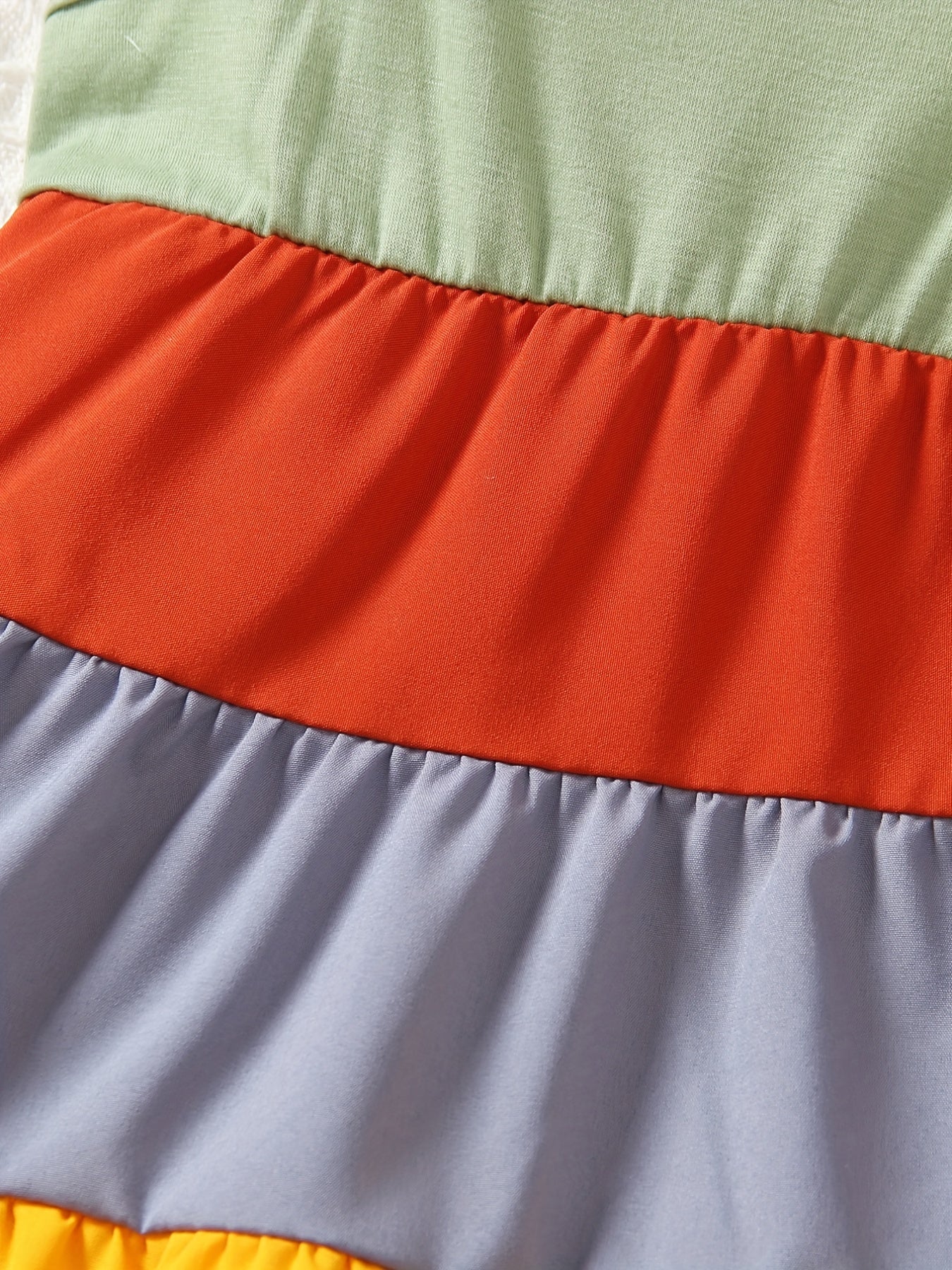 Girls' Spaghetti Strap Color-Blocked Rainbow Cake Dress - Perfect for Outdoor Occasions.