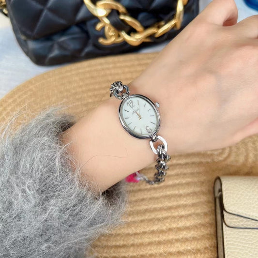 Lady's Steel Strap Watch Gold Oval Hollow Chain Quartz Watch