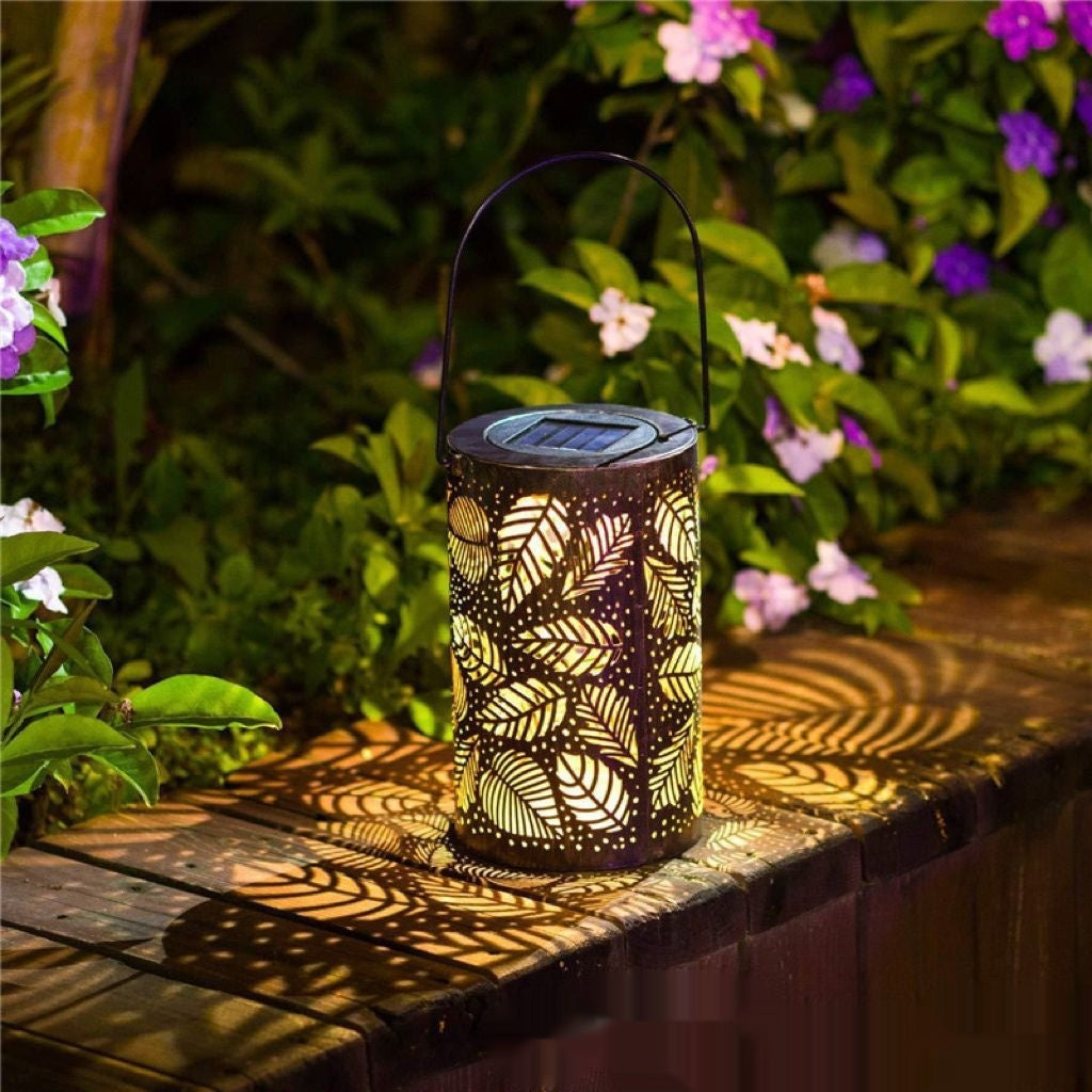 Cross-border Retro Solar Lantern Iron Hollow Storm Lantern Courtyard Decoration Desk Lamp Garden Projection