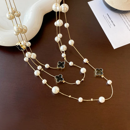 Shijiazu stacked with long pearl necklace women's light luxury temperament sweater chain Joker high sense autumn and winter necklace