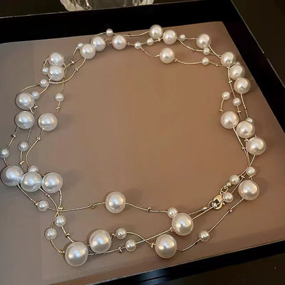 Shijiazu stacked with long pearl necklace women's light luxury temperament sweater chain Joker high sense autumn and winter necklace