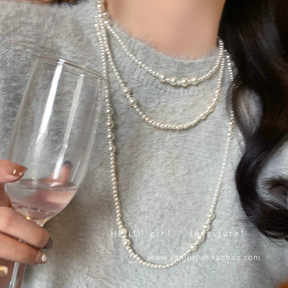 Shijiazu stacked with long pearl necklace women's light luxury temperament sweater chain Joker high sense autumn and winter necklace