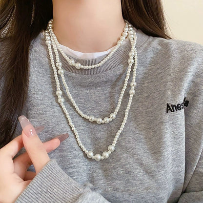 Shijiazu stacked with long pearl necklace women's light luxury temperament sweater chain Joker high sense autumn and winter necklace