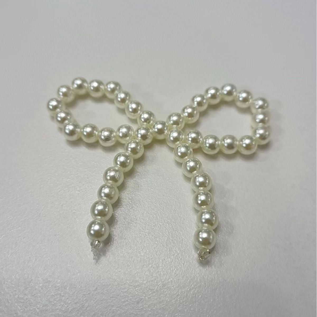 Wholesale bouquet bow jewelry imitation pearl cake decoration bow chain Valentine's Day accessories accessories decoration