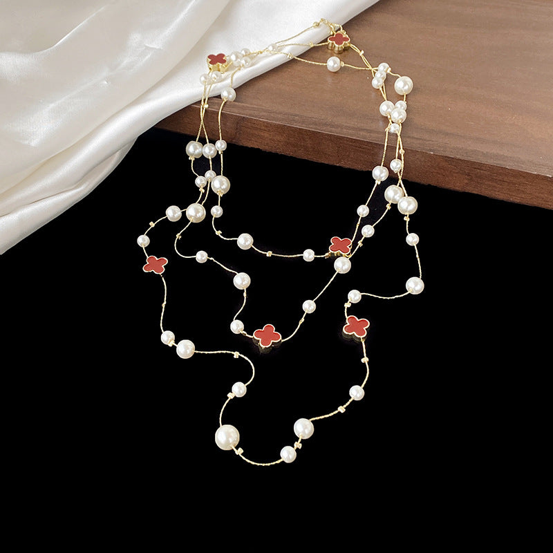 Shijiazu stacked with long pearl necklace women's light luxury temperament sweater chain Joker high sense autumn and winter necklace