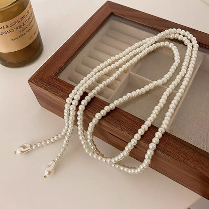 Shijiazu stacked with long pearl necklace women's light luxury temperament sweater chain Joker high sense autumn and winter necklace