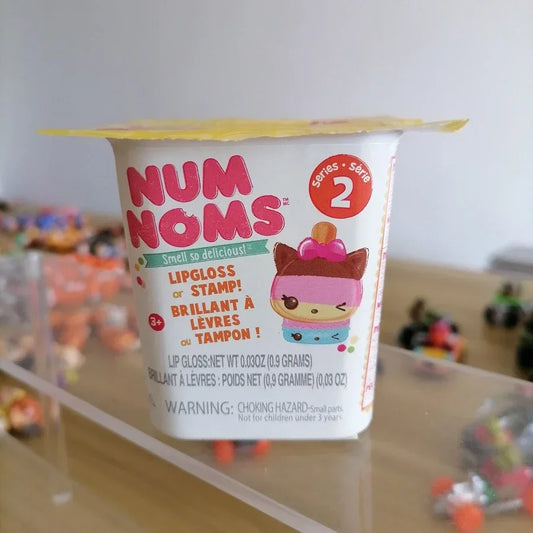 NUMNOMS Fragrance Dolls Cute Kids Toy Scented Lipgloss Stamp Model Blind box Children Girls Birthday Gifts Collectible Ornaments