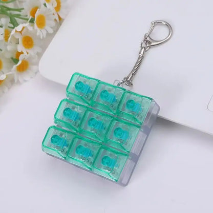 9-in-1 Keyboard Keychain Fidget Toy Decompression Button Finger Clicker Toys Stress Relief Keyboard Fidget Sensory Toys for kids
