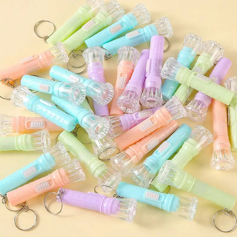 12-24PCS Candy Color Glowing Flashlight Camping Toy Birthday Party Favor Kids Gifts School Prize Wedding Gifts Guests Giveaways